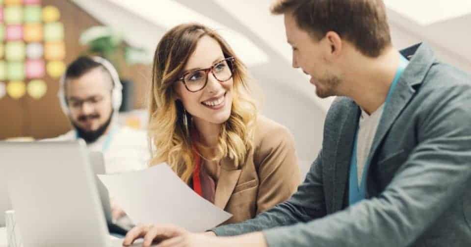 Business professionals collaborating during a meeting in Nashville office.